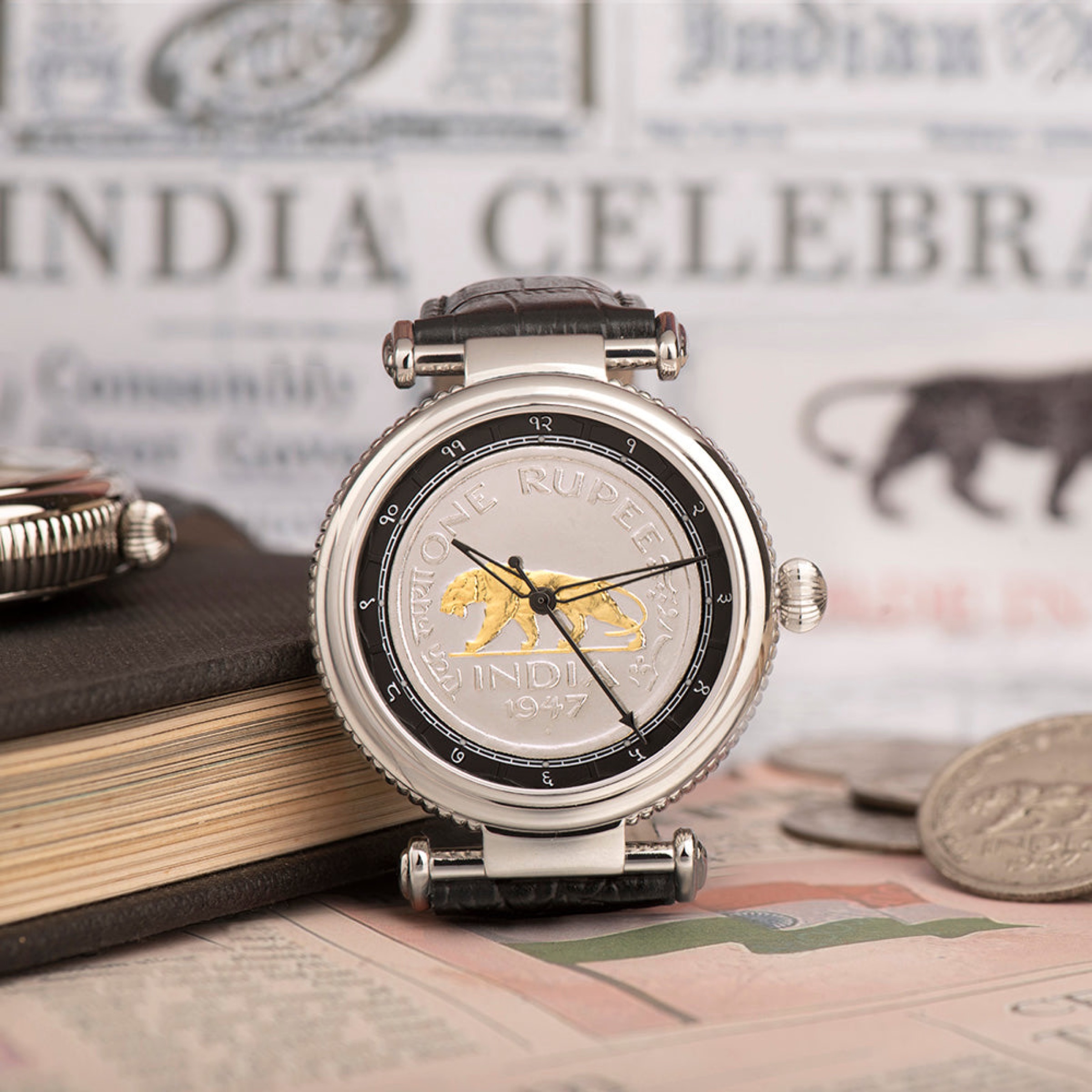 Devanagari Baagh Steel standing on 1947 newspapers headlined India celebrates